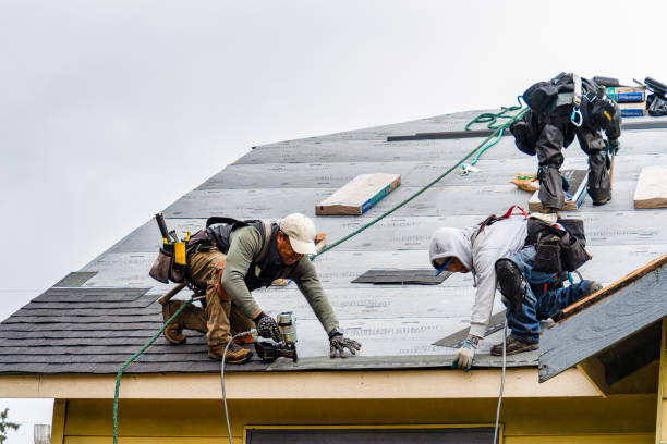 Professional Gutter Installation technician working in Bellmore, NY